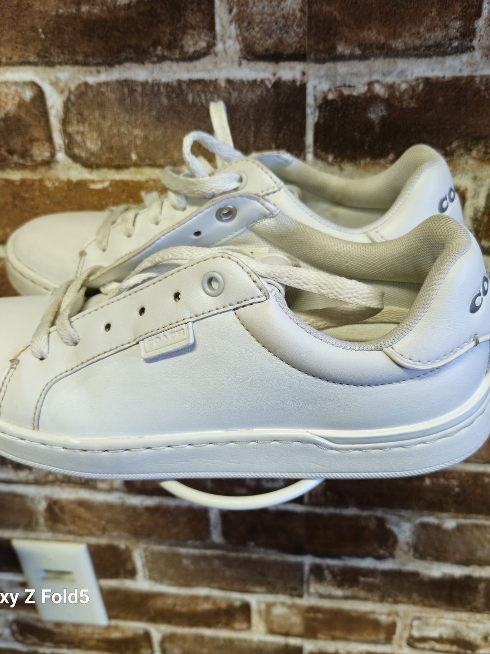 Classic White Sneakers — (Brand: )